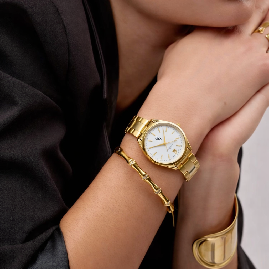 Montre Femme rond Doré bracelet doré fond blanc