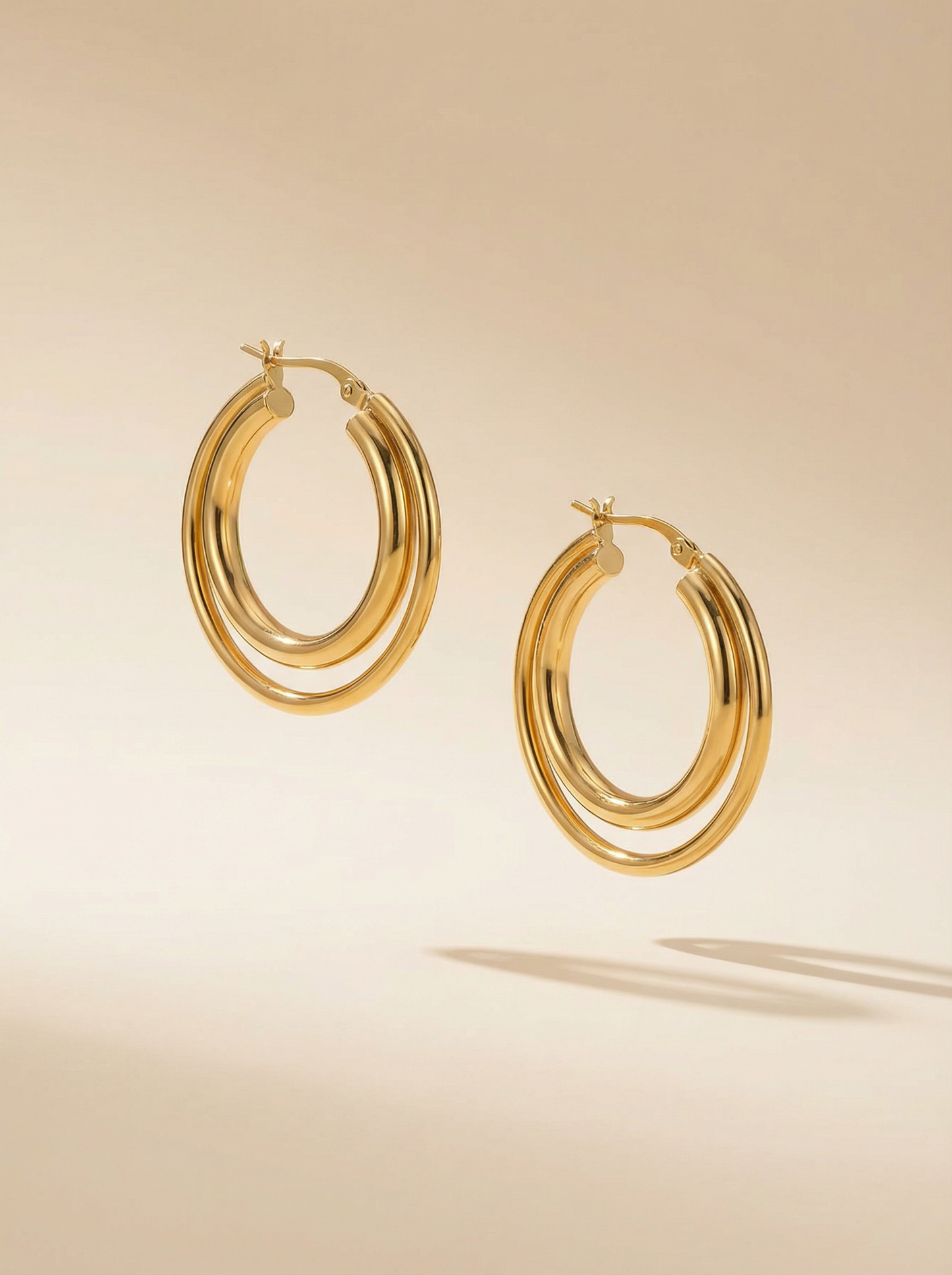 Boucles d'oreilles double créole croisé